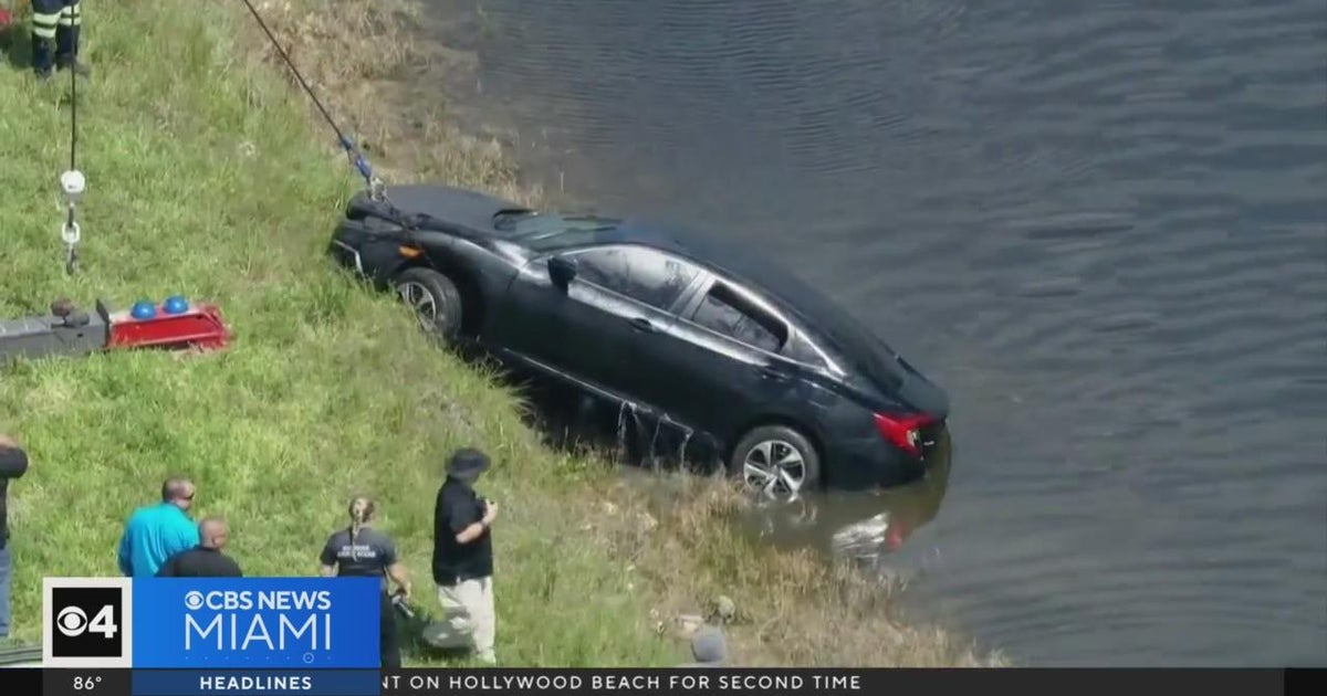 Body found in car pulled from Sunrise canal - CBS Miami
