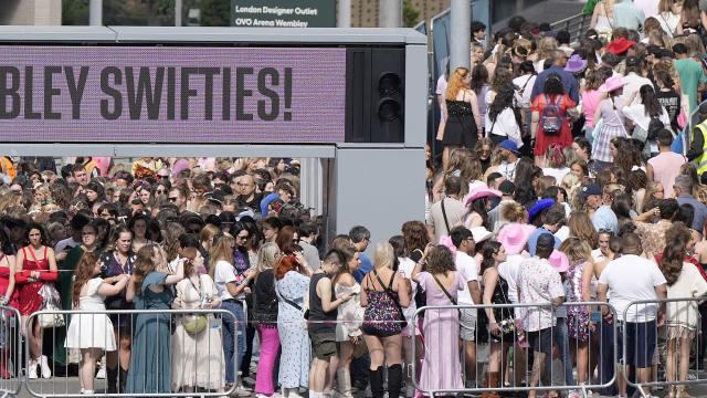 Fans gather for Taylor Swift's concert at Wembley Stadium, in London 