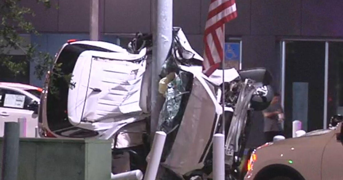 Police investigate deadly crash that leaves car wrapped around pole in Doral Police investigate deadly crash that leaves car wrapped around pole in Doral