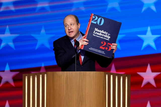Colorado Gov. Jared Polis speaks on stage during the third day of the Democratic National Convention at the United Center on Aug. 21, 2024, in Chicago.