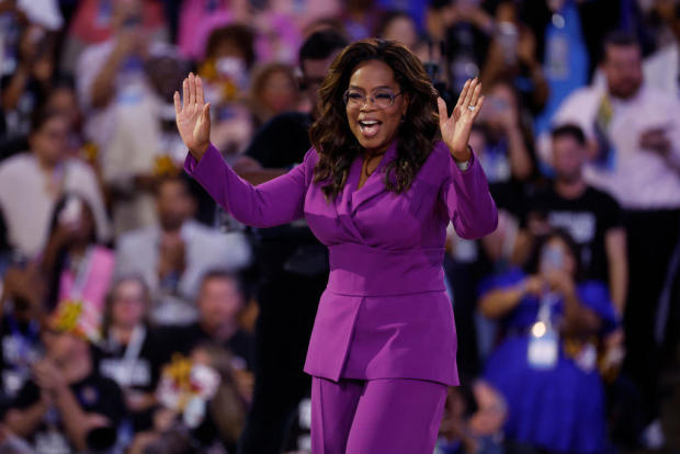 Oprah Winfrey arrives to speak on stage during the third day of the Democratic National Convention at the United Center on Aug. 21, 2024 in Chicago. 