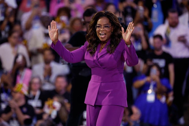 Oprah Winfrey arrives to speak on stage during the third day of the Democratic National Convention at the United Center on Aug. 21, 2024 in Chicago.