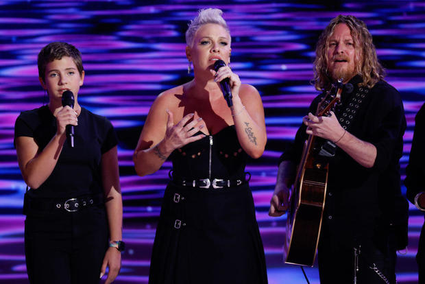 Willow Sage Hart, Pink and Justin Derrico perform during the final day of the Democratic National Convention at the United Center on Aug. 22, 2024, in Chicago. 