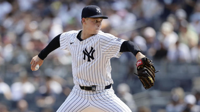 Will Warren #98 of the New York Yankees pitches during the first inning against the Colorado Rockies at Yankee Stadium on August 24, 2024 in New York City. 