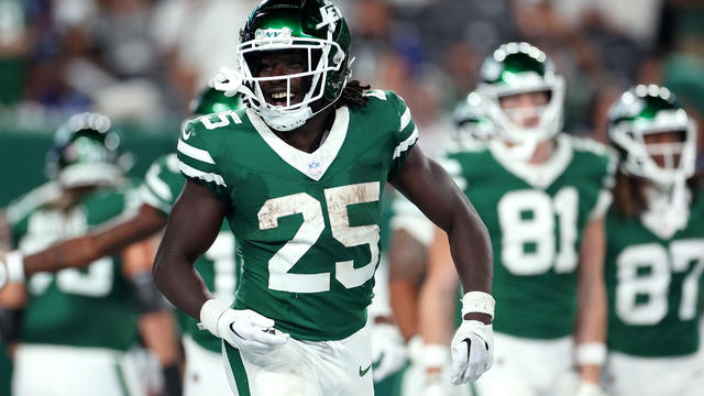 Israel Abanikanda #25 of the New York Jets reacts after a touchdown against the New York Giants during the second quarter of a preseason game at MetLife Stadium on August 24, 2024 in East Rutherford, New Jersey. 