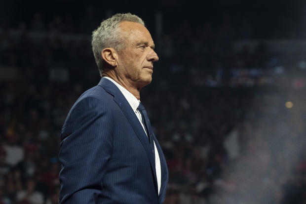 Former Republican presidential candidate Robert F. Kennedy Jr. listens during a campaign rally for Republican presidential nominee, former President Donald Trump at Desert Diamond Arena on August 23, 2024 in Glendale, Arizona. 