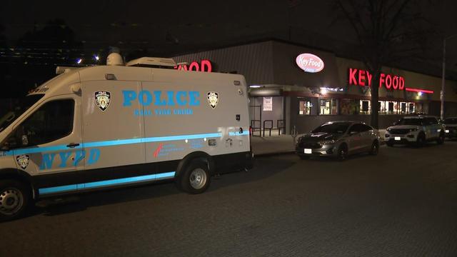 An NYPD vehicle parked outside a Key Food supermarket in Queens Village. 