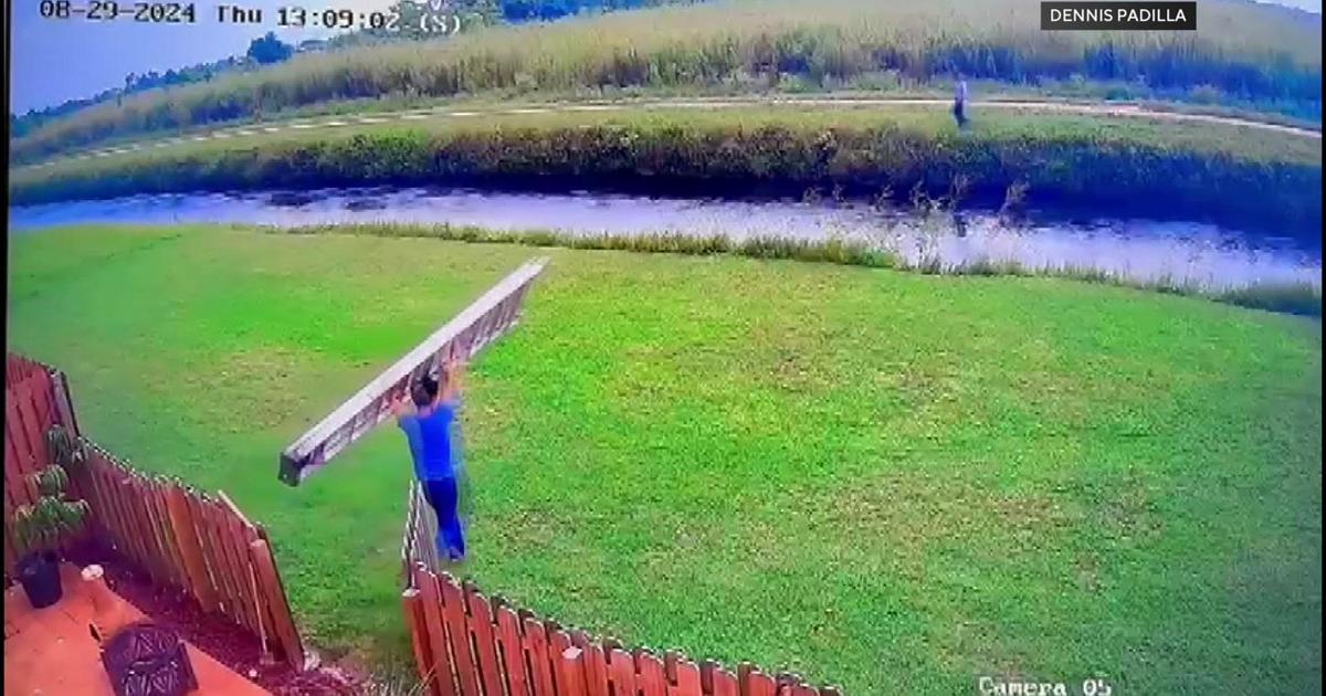 Surveillance video captures men rushing to help riders after ATV plunges in canal