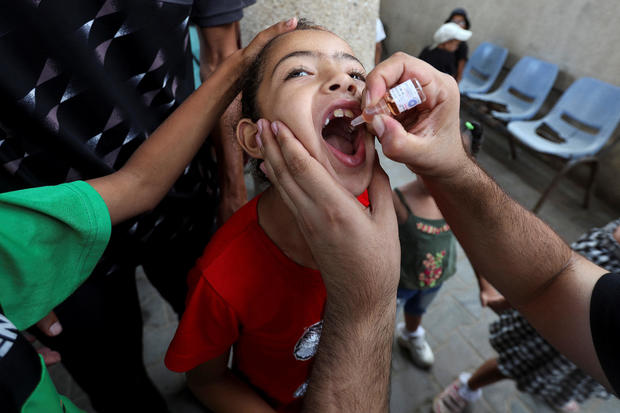 Palestinian children are vaccinated against polio, in Deir Al-Balah in the central Gaza Strip 