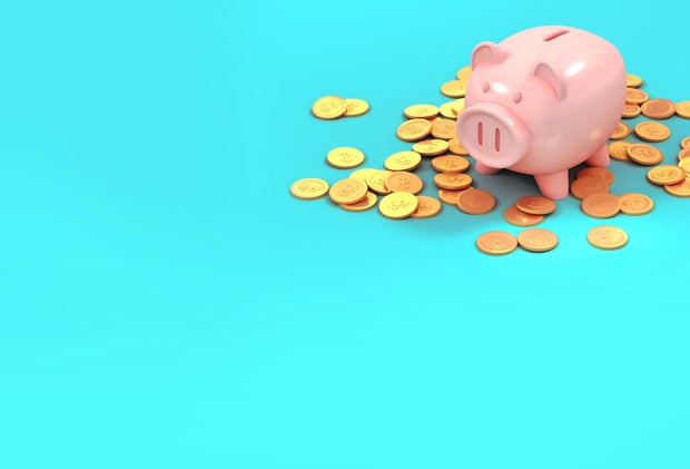 piggy bank and gold coins