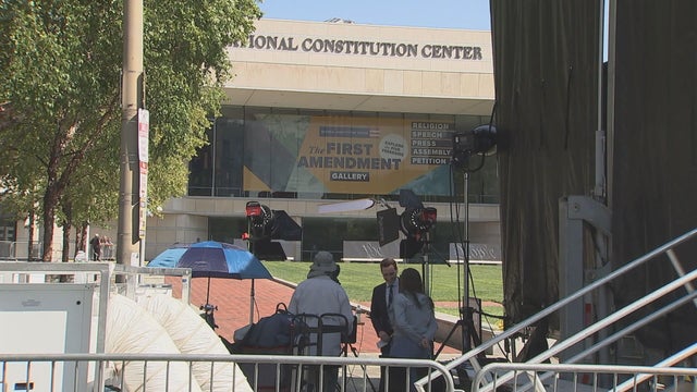 Members of the media are seen near the National Constitution Center in Old City, Philadelphia