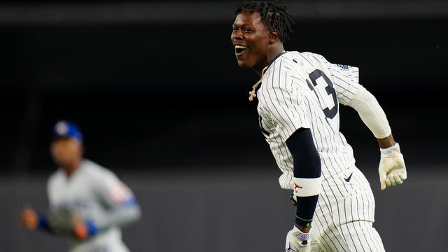 Jazz Chisholm Jr. #13 of the New York Yankees reacts after hitting a one RBI single to win the game in the 11th inning during the game between the Kansas City Royals and the New York Yankees at Yankee Stadium on Wednesday, September 11, 2024 in New York, 