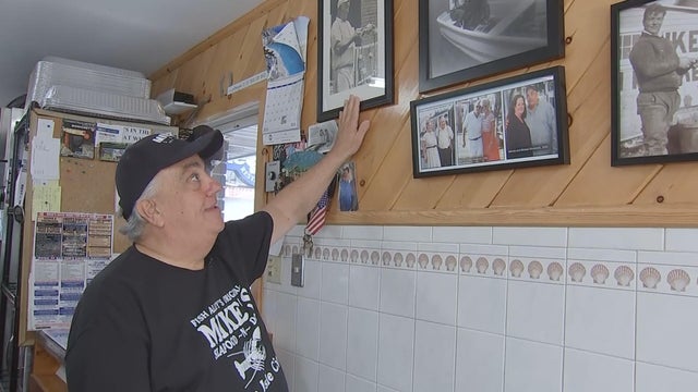 Mike Monachetti points to a photo of one of the restaurant's founders