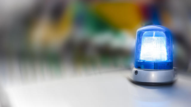 Blue light on police car, close-up 