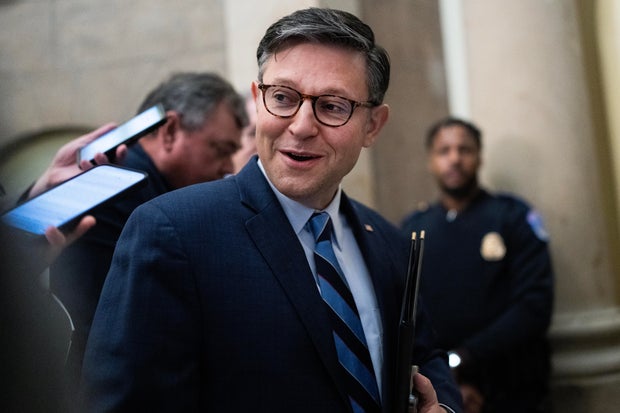 Speaker of the House Mike Johnson talks with reporters in the U.S. Capitol after the last votes of the week on Thursday, Sept. 12, 2024.