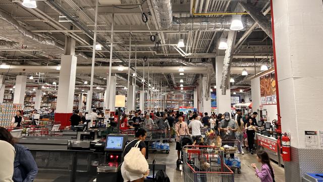 Crowded busy Costco checkout and food court area, Queens, New York 