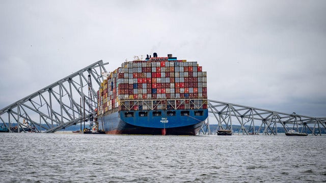 The container ship Dali is seen in the wreckage of Francis Scott Key Bridge almost a week after it hit a structural pier causing a subsequent bridge collapse, April 1, 2024.