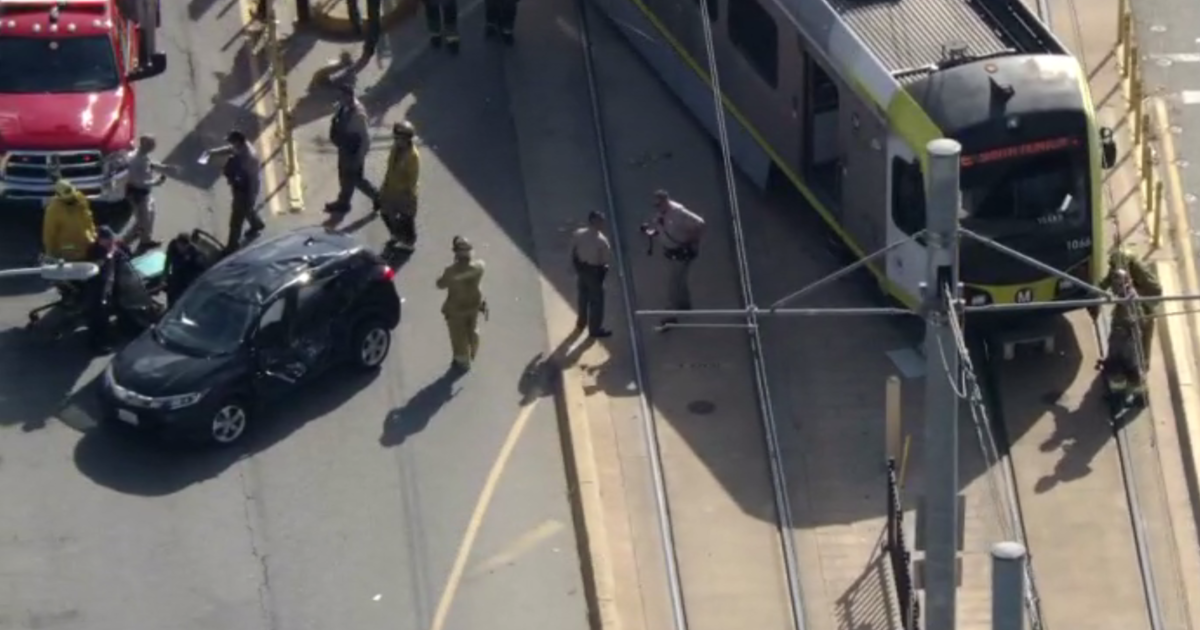 Metrolink train hits car, derails in East Los Angeles neighborhood