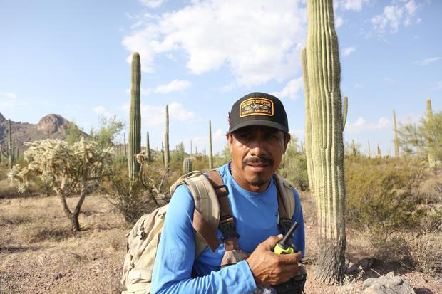 Roberto Resendiz, 48, reminds other members of the Armadillos via his walkie-talkie that Jose Luis Salinas Pineda was wearing black shoes and camo gear when he crossed the Arizona-Mexico border in early June. 