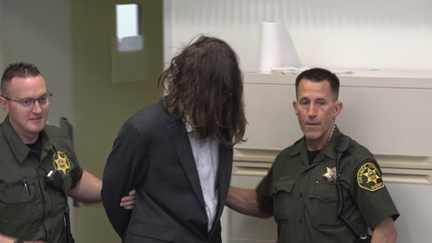 Sam Woodward walks into court