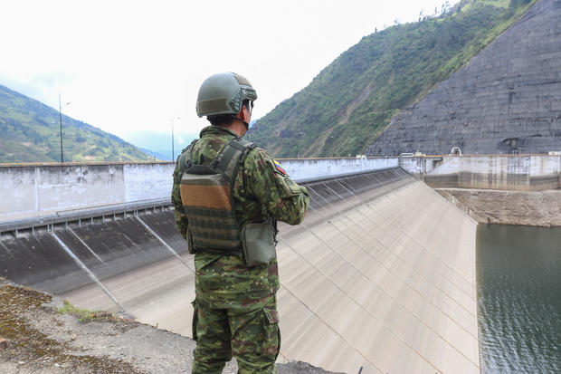 A soldier stands guard at the Mazar hydroelectric plant in Las Palmas, Ecuador, Sept. 17, 2024. 