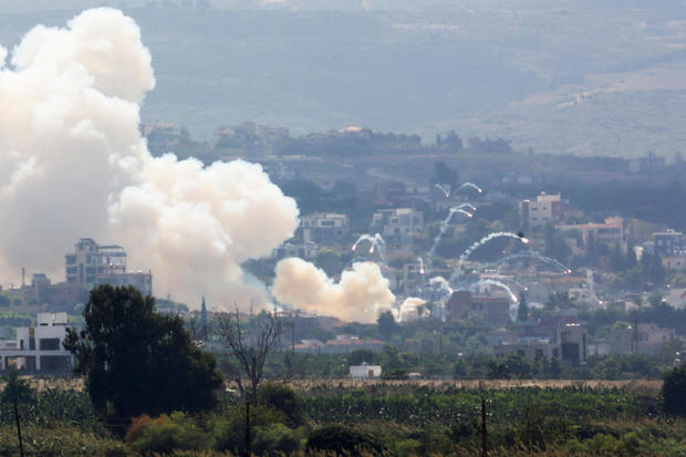 Smoke billows over southern Lebanon following Israeli strikes, as seen from Tyre, southern Lebanon 