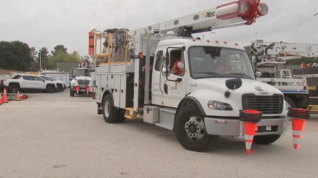 PECO trucks head out of the parking lot on their way to hurricane-affected areas 