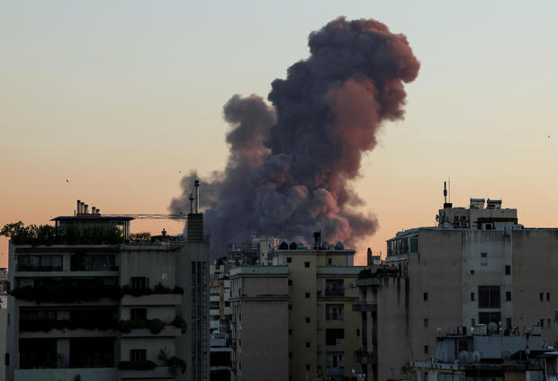 Smoke rises after explosions in Beirut 