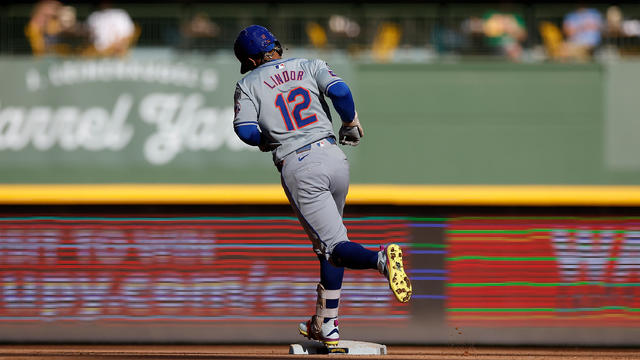 Francisco Lindor #12 of the New York Mets rounds second base after hitting a solo home run in the sixth inning against the Milwaukee Brewers at American Family Field on September 29, 2024 in Milwaukee, Wisconsin. 