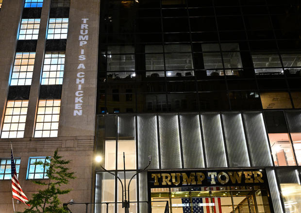 The Democratic National Committee Projects Messages On Trump Tower On The Eve Of The Vice Presidential Debate 