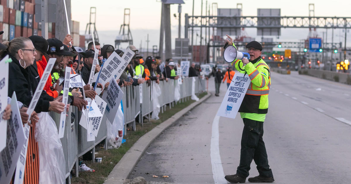 Wood traces shape as port strike starts for hundreds of New York and New Jersey dockworkers