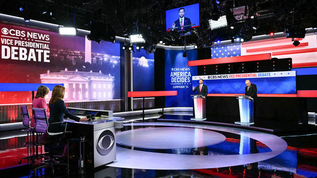 Sen. JD Vance and Minnesota Gov. Tim Walz participate in the vice presidential debate hosted by CBS News at the CBS Broadcast Center in New York City on Oct. 1, 2024. 