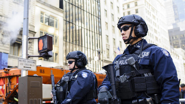 Heavily-armed police keep watch in Midtown Manhattan on 