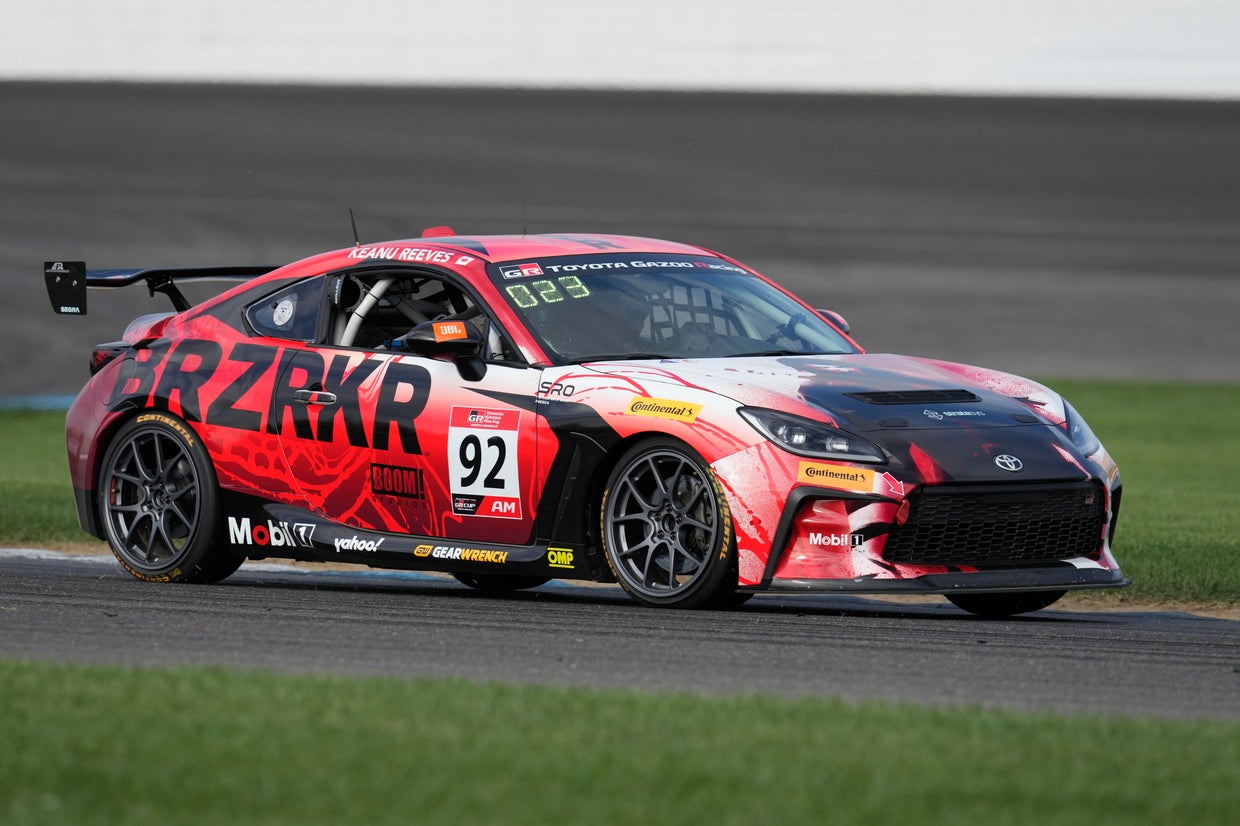 Keanu Reeves debuts as pro auto racer at Indianapolis Motor Speedway ...
