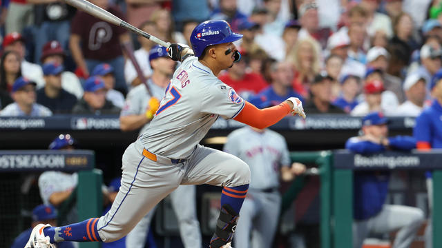 Mark Vientos #27 of the New York Mets hits a one RBI single to tie the game in the seventh inning during Game 1 of the Division Series presented by Booking.com between the New York Mets and the Philadelphia Phillies at Citizens Bank Park on Saturday, Octo 