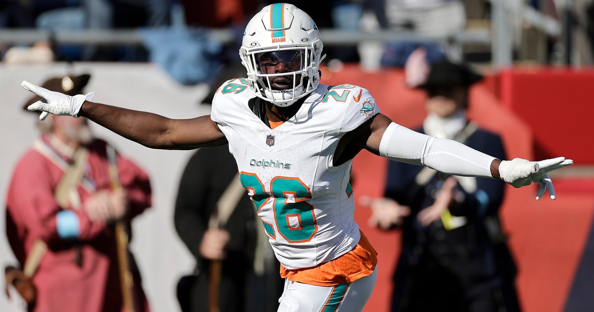 Miami Dolphins defeat the New England Patriots 15-10 Miami Dolphins defeat the New England Patriots 15-10