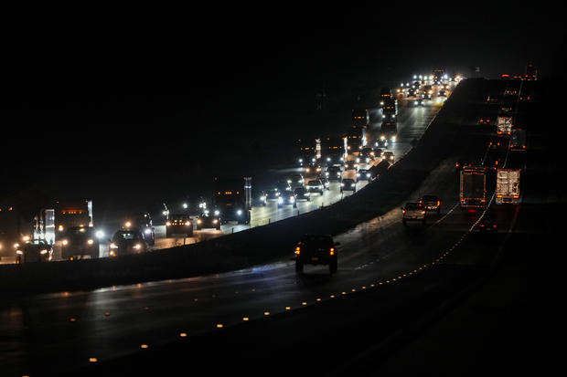 Heavy traffic flows northbound on Interstate 75 as people evacuate the Tampa Bay area ahead of Hurricane Milton's arrival Oct. 7, 2024, in Ocala, Florida. 