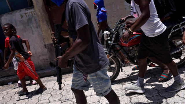 FILE PHOTO: The Wider Image: Camping in schools, hungry Haiti families ask: when will normality return? 