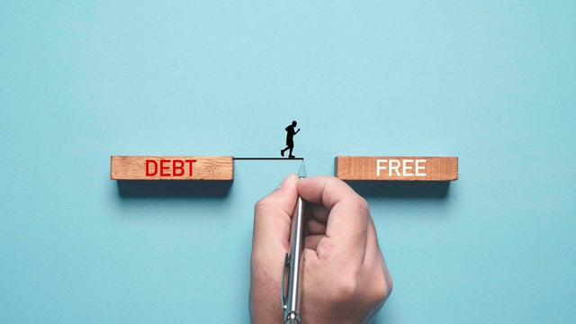 Hand writing line to connect between deb and free wording for solving business consumer burden financial debt or borrow mortgage failure crisis concept. 