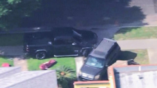 pursuit-truck-slams-into-parked-car.jpg 