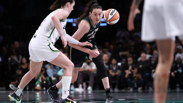 Breanna Stewart #30 of the New York Liberty drives past Bridget Carleton #6 of the Minnesota Lynx during the third quarter of Game Two of the WNBA Finals at Barclays Center on October 13, 2024 in New York City. 