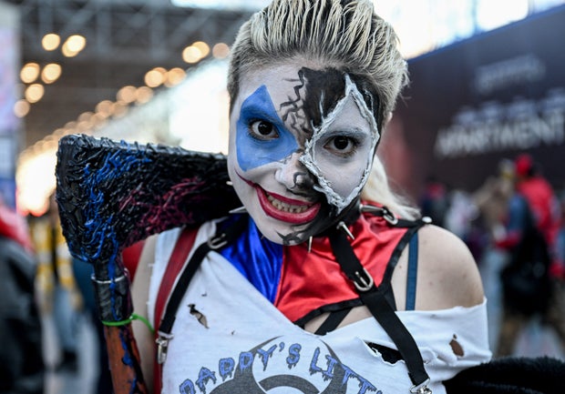 People wearing costumes and makeup visit New York Comic-Con 2024 held at Jacob K. Javits Center in New York, United States on October 17, 2024.