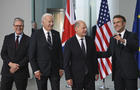 President Biden meets with French President Emmanuel Macron, British Prime Minister Keir Starmer and German Chancellor Olaf Scholz in Berlin on Oct. 18, 2024. 