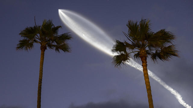 SpaceX Falcon 9 Rocket Launch At Sunset 