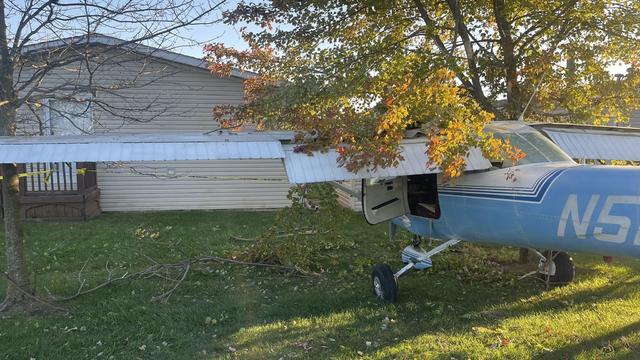 Plane crashes in a field behind houses in Washtenaw County 