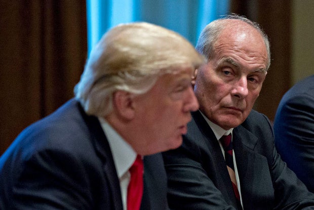White House chief of staff John Kelly listens as President Donald Trump speaks at a briefing with senior military leaders in the Cabinet Room of the White House on Oct. 5, 2017, in Washington, D.C.