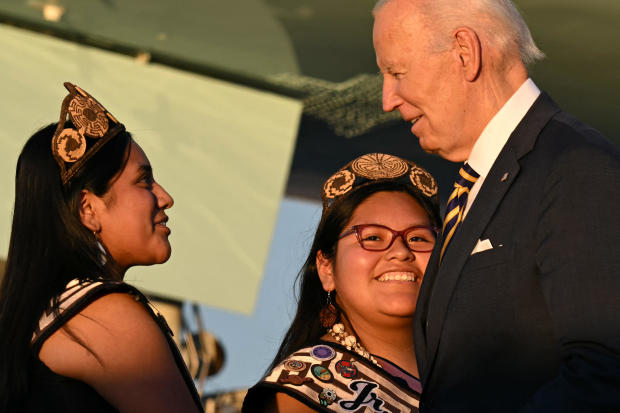 President Biden is greeted by members of a Native American community upon arrival at Phoenix Sky Harbor International Airport in Phoenix, Arizona, on Oct. 24, 2024. 