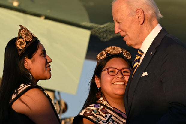 President Biden is greeted by members of a Native American community upon arrival at Phoenix Sky Harbor International Airport in Phoenix, Arizona, on Oct. 24, 2024.