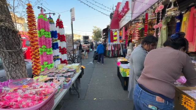 Street vendors and storefronts in Little Guyana in Queens. 