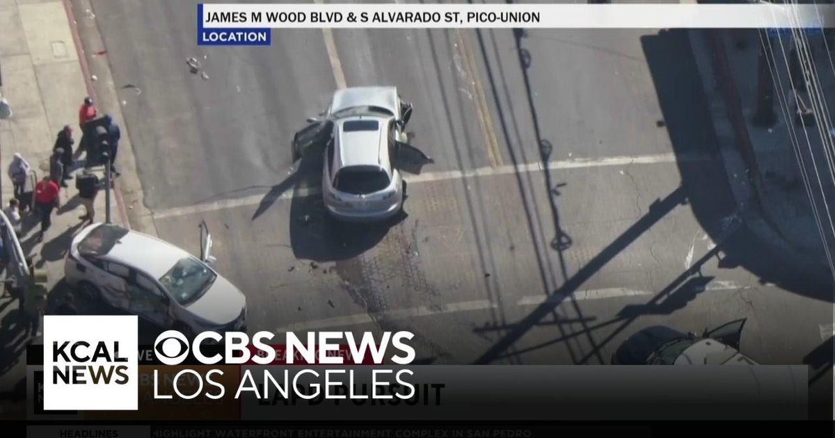 Robbery pursuit suspect crashes into another vehicle at a South Los ...